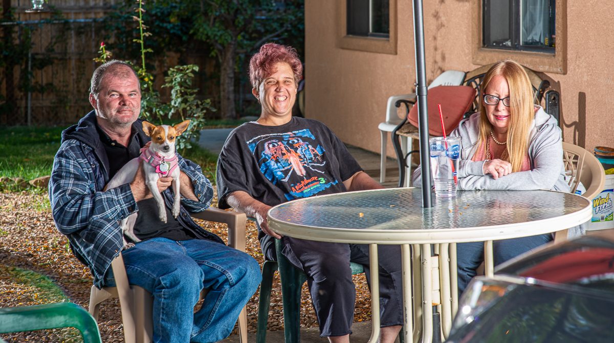 Friends at a patio table